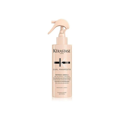 Light pink bottle of Kerastase Curl Manifesto Refresh Absolu Hair Spray