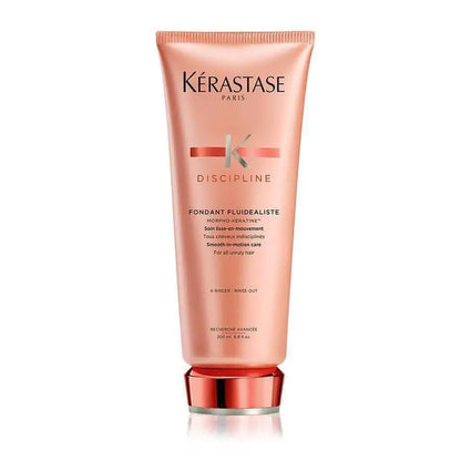 Peach-colored Kérastase Discipline Fondant Fluidéaliste 200ml hair care product with red cap