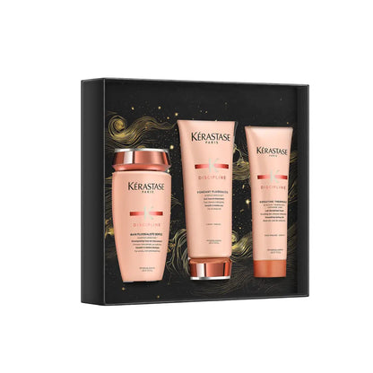 Gift set of Kérastase hair care products in pink packaging.