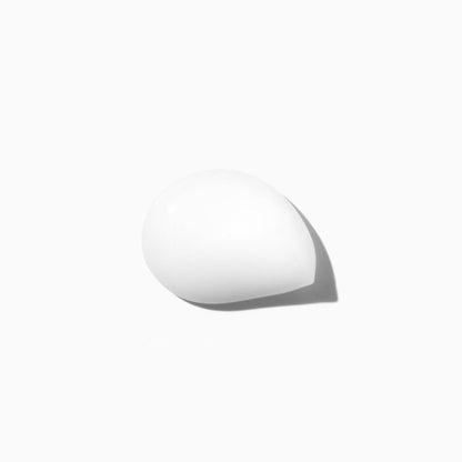 Image of a white egg with a soft shadow, perfect for Kerastase Discipline Blow-Dry Primer