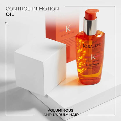 Orange bottle of Kerastase Discipline Oléo-Relax Advanced Hair Oil 100ml for volumizing