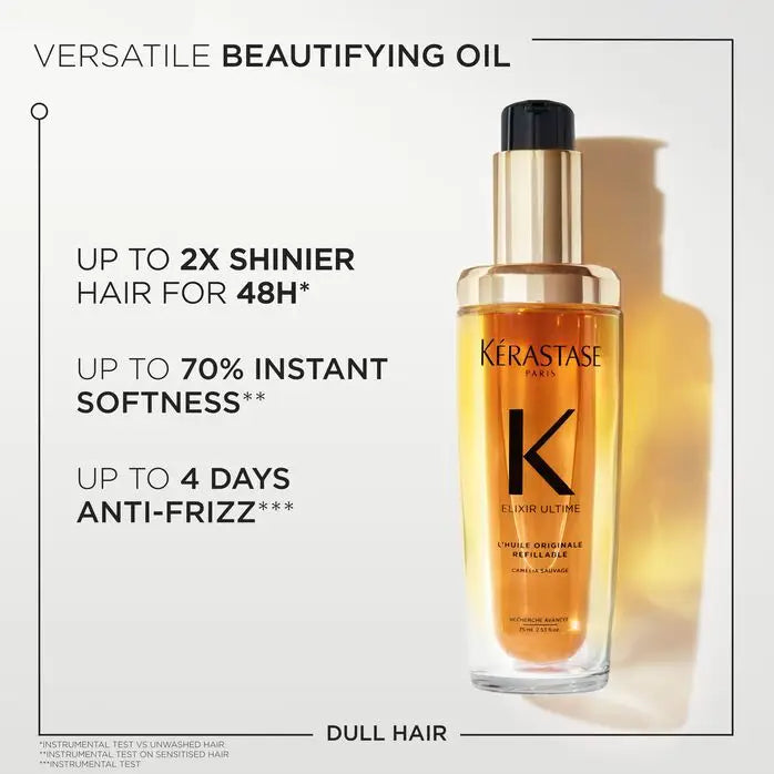 Golden-hued hair oil in a sleek glass bottle with a black cap and Kérastase branding.