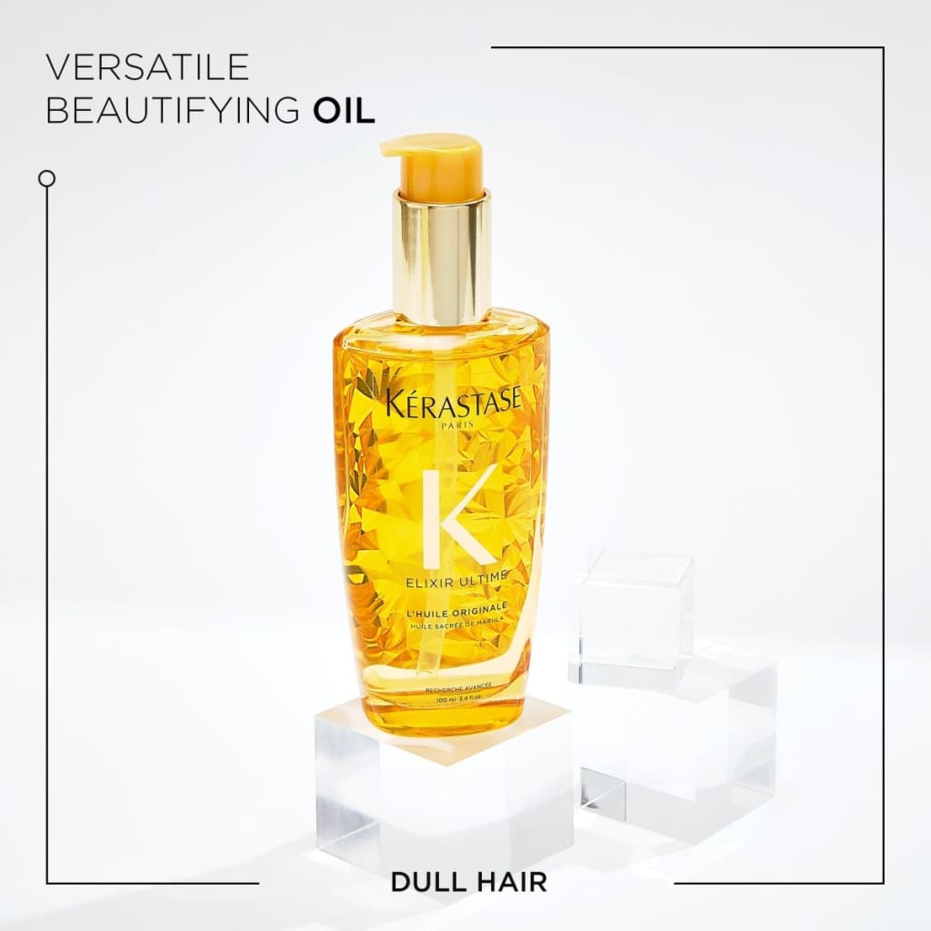 Golden bottle of Kérastase Elixir Ultime L’Huile Originale Hair Oil 100ml with yellow cap