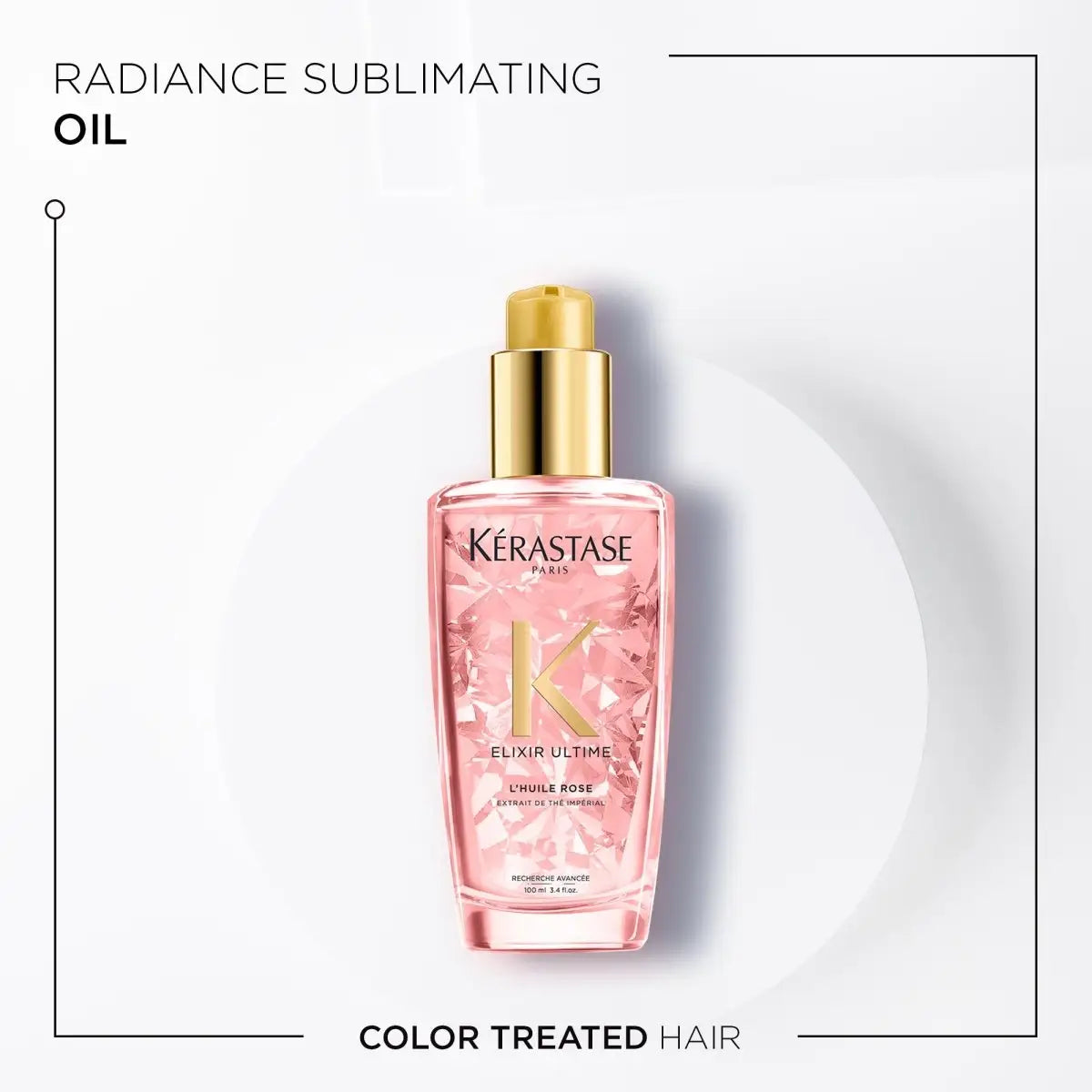 Pink glass bottle of Kérastase Elixir Ultime L’Huile Rose hair oil with a gold pump dispenser