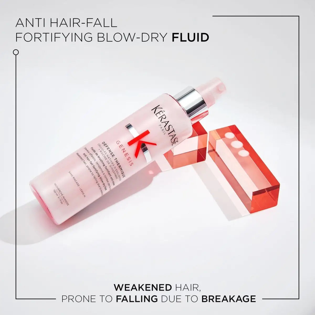 Kerastase Genesis Défense Thermique Blow-Dry Primer 150ml bottle with pink liquid and red arrow