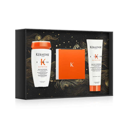 Gift set of Kérastase hair care products in a decorative box.