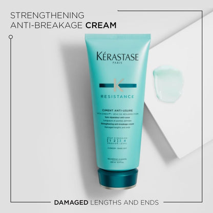 Turquoise tube of Kérastase Resistance Ciment Anti-Usure Hair Conditioner 200ml