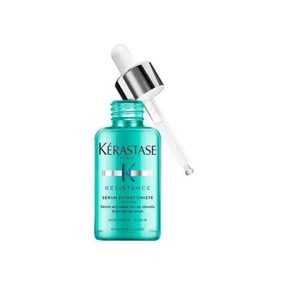 Turquoise glass bottle of Kérastase Resistance Serum Extentioniste with dropper cap