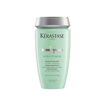 Mint green bottle of Kerastase Specifique Bain Divalent shampoo with silver cap 250ml