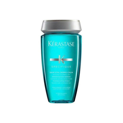 Turquoise bottle of Kérastase Spécifique Bain Vital Dermo-Calm Shampoo 250ml with silver cap