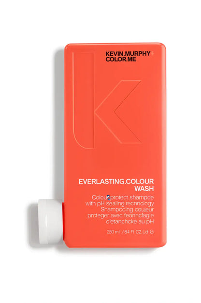 Bright orange bottle of Kevin Murphy Everlasting Colour Wash shampoo.