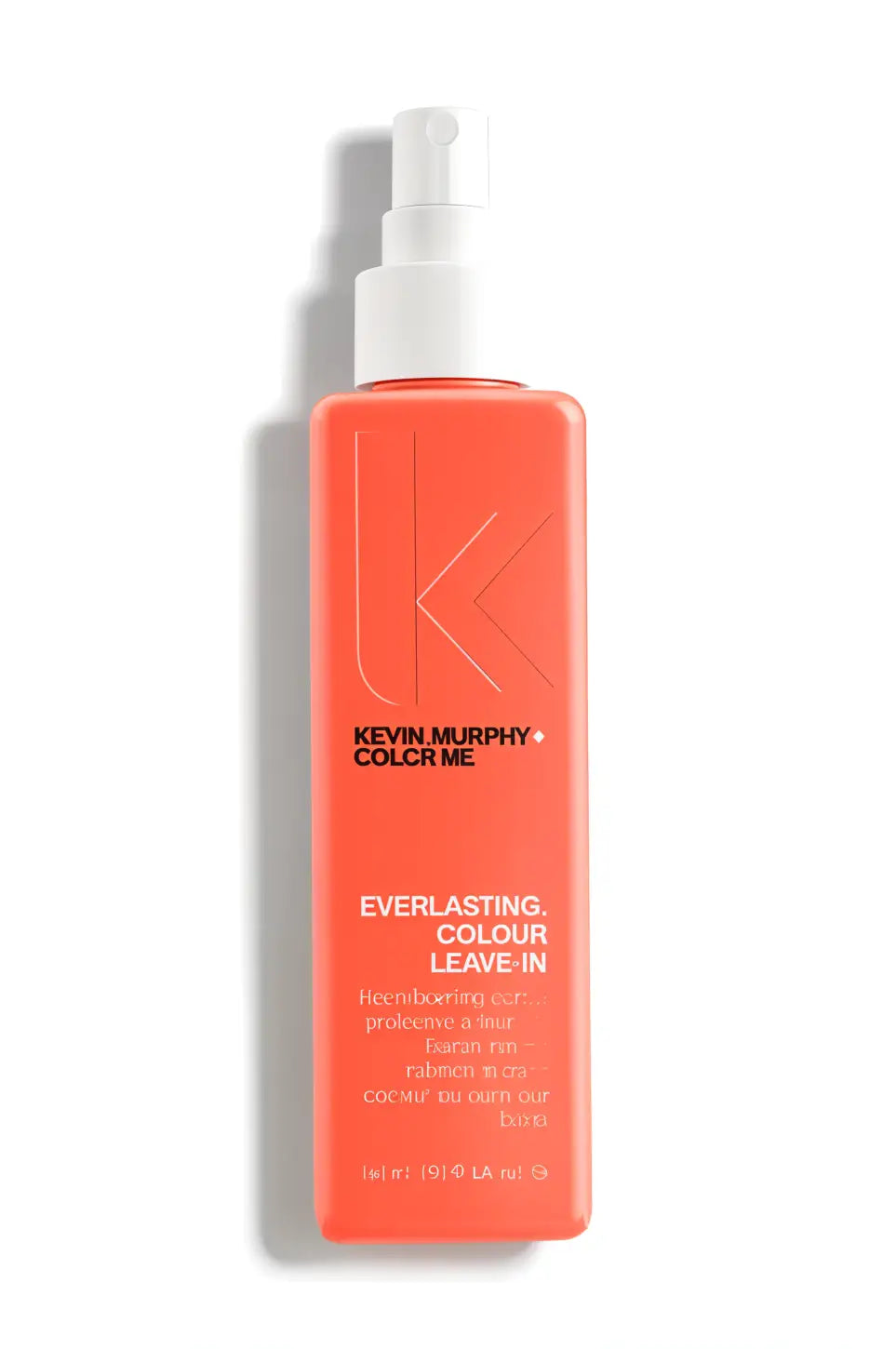 Bright coral-colored spray bottle of hair product labeled ’Kevin Murphy Color.Me Everlasting Colour Leave In’.