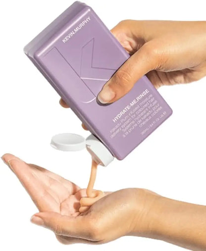 Lavender Kevin Murphy Hydrate.Me.Rinse 250ml smoothing conditioner in hand