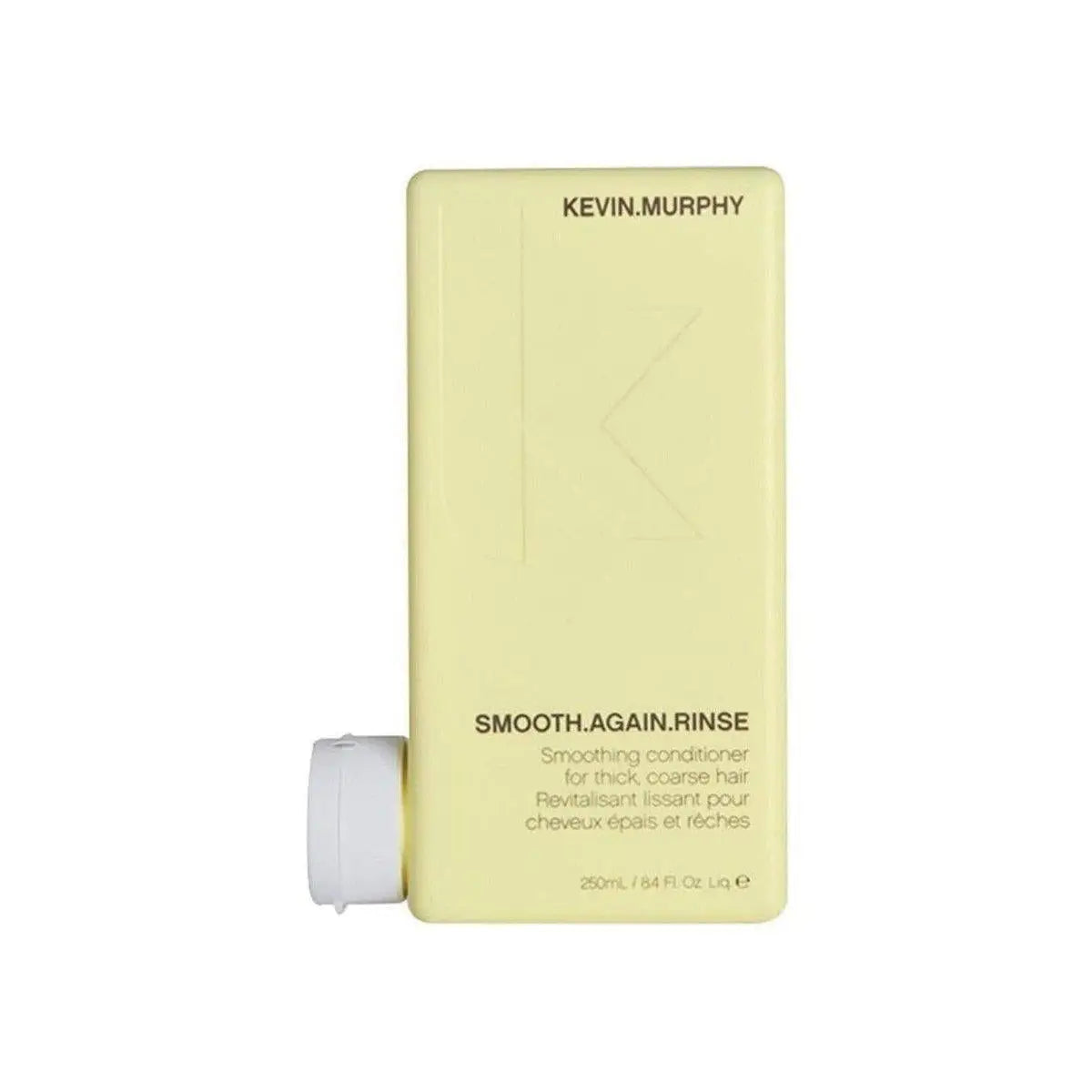 Pale yellow bottle of Kevin Murphy Smooth.Again.Rinse 250ml conditioner for seamless smoothing