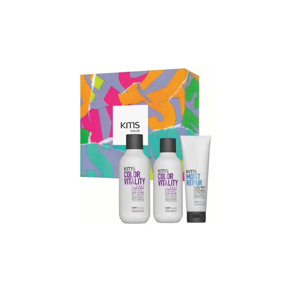 Colorful gift box containing hair care products from the KMS brand.