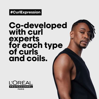 L'Oréal Curl Expression: Expert Co-developed Curl Products for All Curl Types. Featuring a Model with Curly Hair.