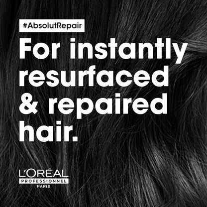 Advertisement for L’Oréal Professionnel Absolut Repair Conditioner 200ml on hair strands