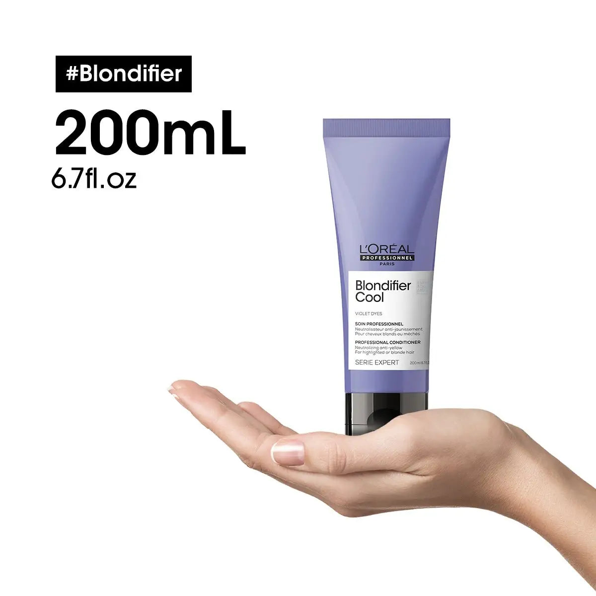 Purple tube of L’Oreal Blondifier Cool conditioner in hand - 200ml, L’Oréal Professionnel