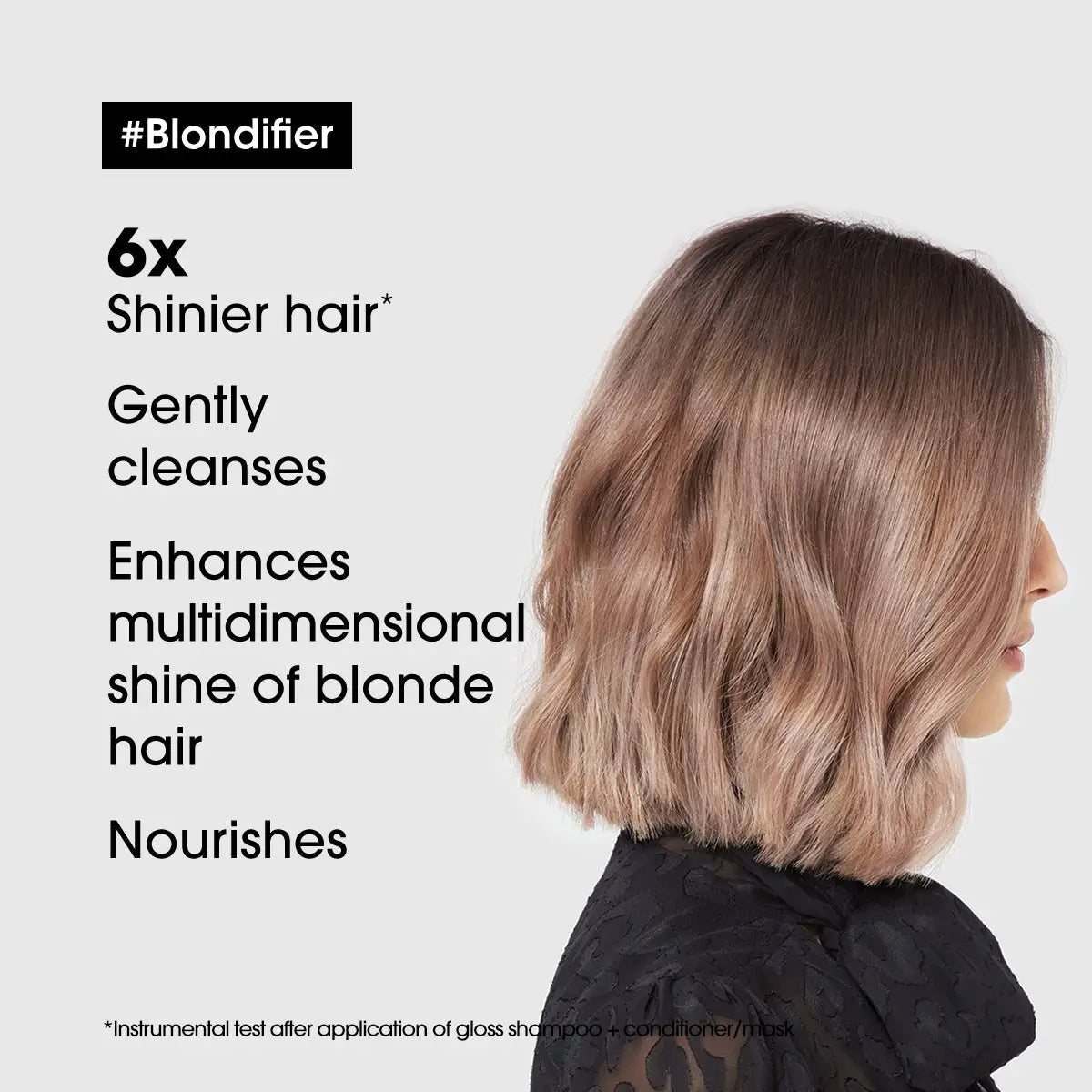 Woman with blonde waves using L’Oreal Professionnel Blondifier Gloss Shampoo