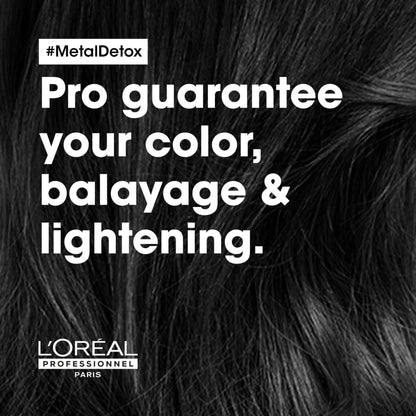 Advertisement for L’Oréal Metal Detox hair treatment guaranteeing color and lightening