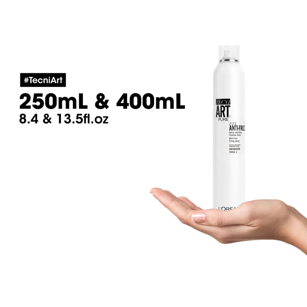 White cylindrical bottle of Loreal Professional Tecni Art Fix Anti Frizz 250ml held in hand