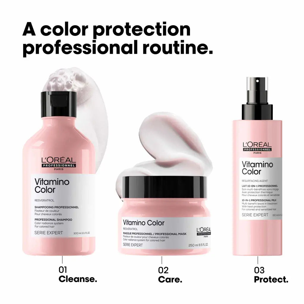 Set of three pink L’Oréal Vitamino Color hair care products for color protection.