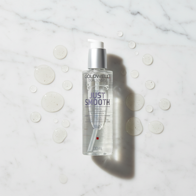 Marble flat lay with clear oil droplets