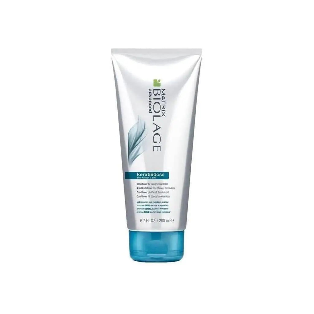 Hair care product Matrix Biolage Keratindose Conditioner with feather graphic on tube