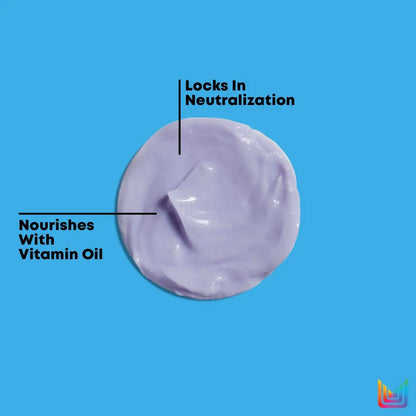 Circular blob of purple cream labeled: Matrix Total Results Brass Off conditioner - 300ml