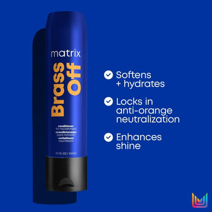 Dark blue Matrix Total Results Brass Off conditioner - 300ml bottle with orange text