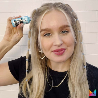 Woman using Matrix Style Link Height Riser, small blue can near blonde hair