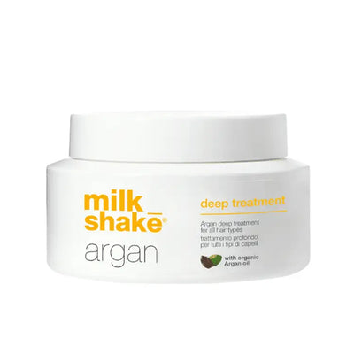 Milkshake Argan Deep Treatment for hair in a white jar with orange and black text