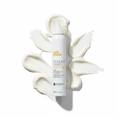 Milkshake Conditioning Whipped Cream leave-in foam conditioner bottle on white creamy background