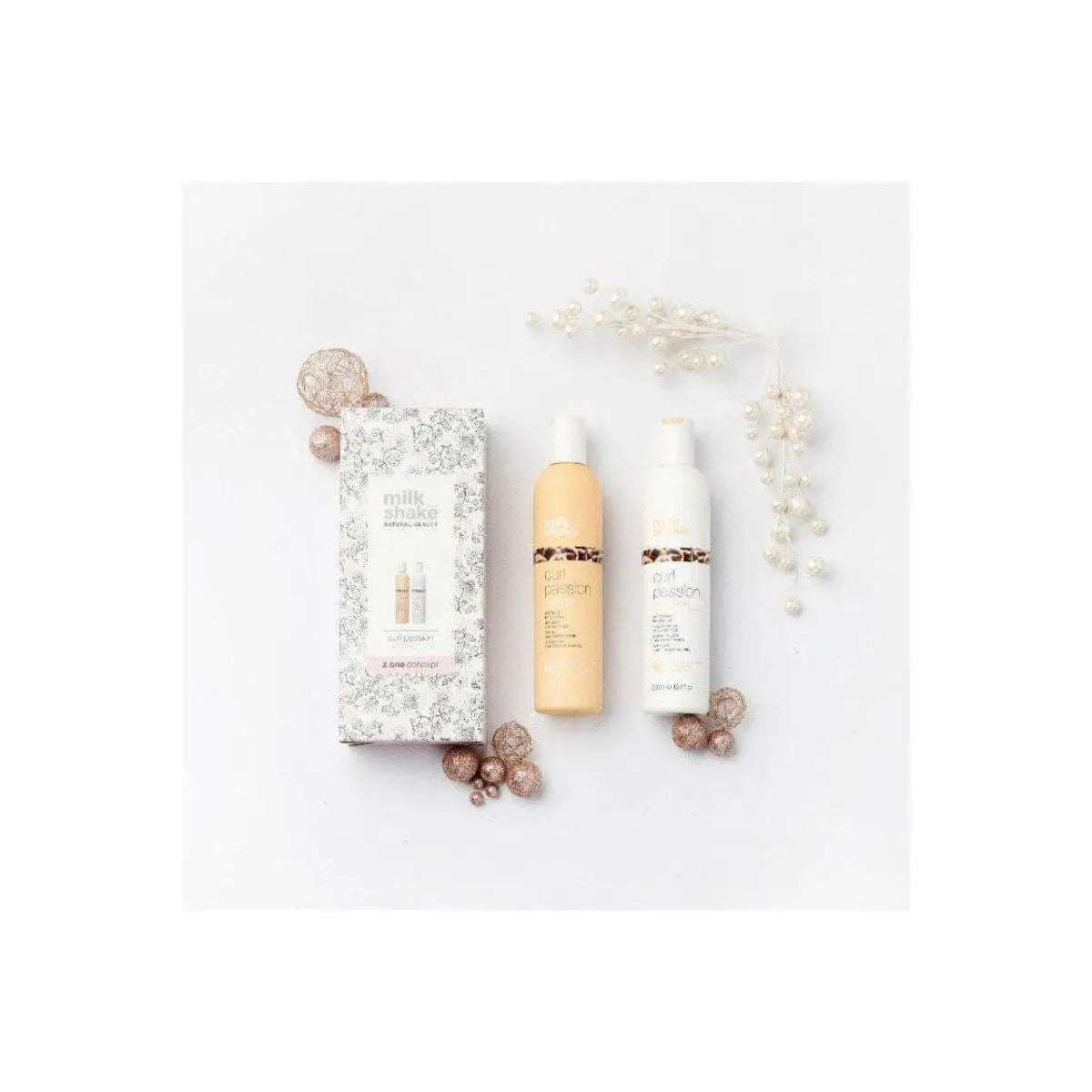 Milkshake Curl Passion Duo Gift Set with two bottles and decorative box with floral accents