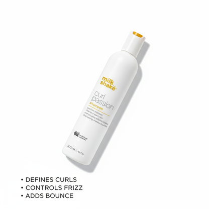 Milkshake Curl Passion Shampoo white bottle with gold text defines curls controls frizz adds bounce