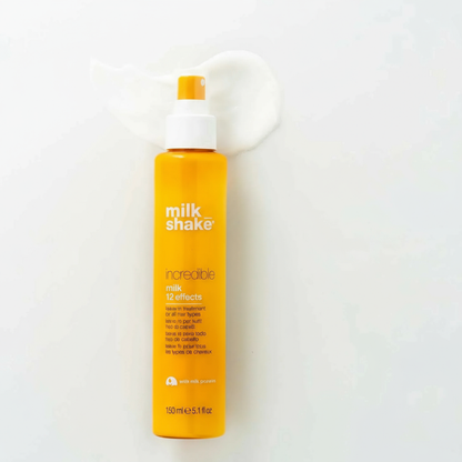 Milk Shake Incredible Milk 12 Effects treatment bottle in yellow with white pump and cream texture