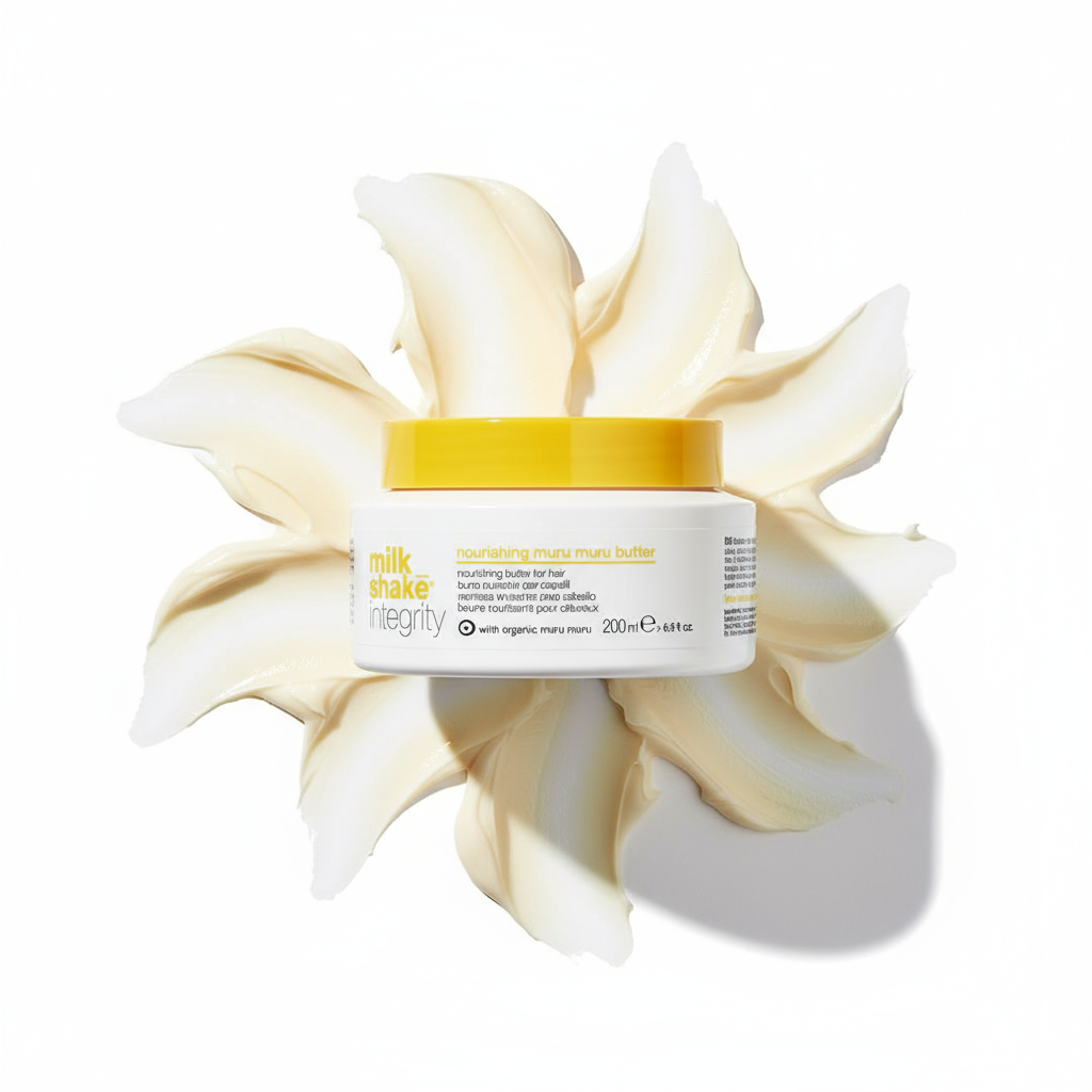 Milkshake Integrity Muru Muru Butter nourishing hair treatment jar with creamy texture spread in background