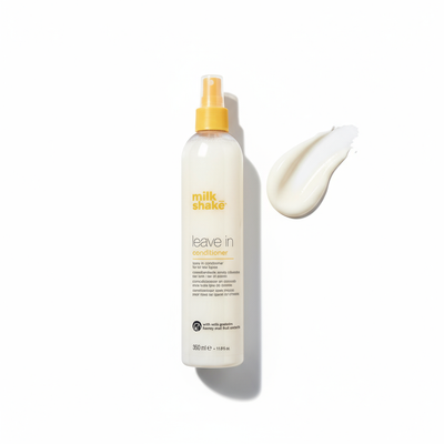 Milkshake leave in conditioner 350ml bottle with yellow spray cap and creamy texture sample