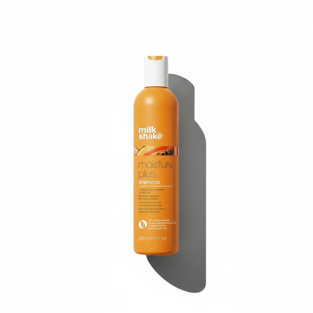 Milkshake Moisture Plus Shampoo in orange bottle with white cap for hydrated hair care