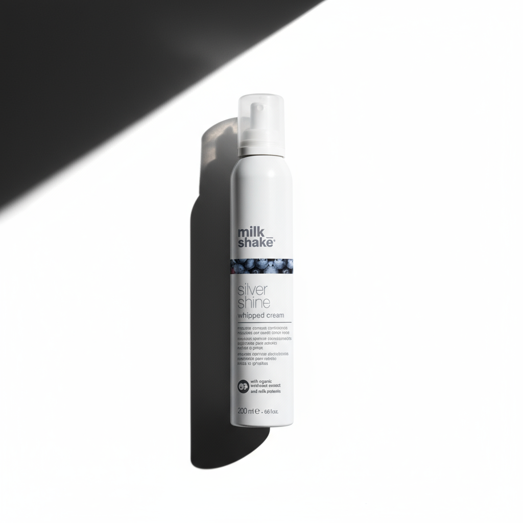 Milkshake Silver Shine conditioner for blonde hair in white bottle with pump on white background