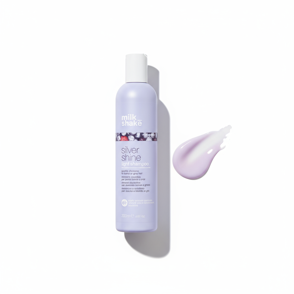 Milkshake Silver Shine light Shampoo bottle with purple cream smear on white background