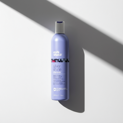 Milkshake Silver Shine Shampoo purple bottle designed for enhancing silver and blonde hair shine