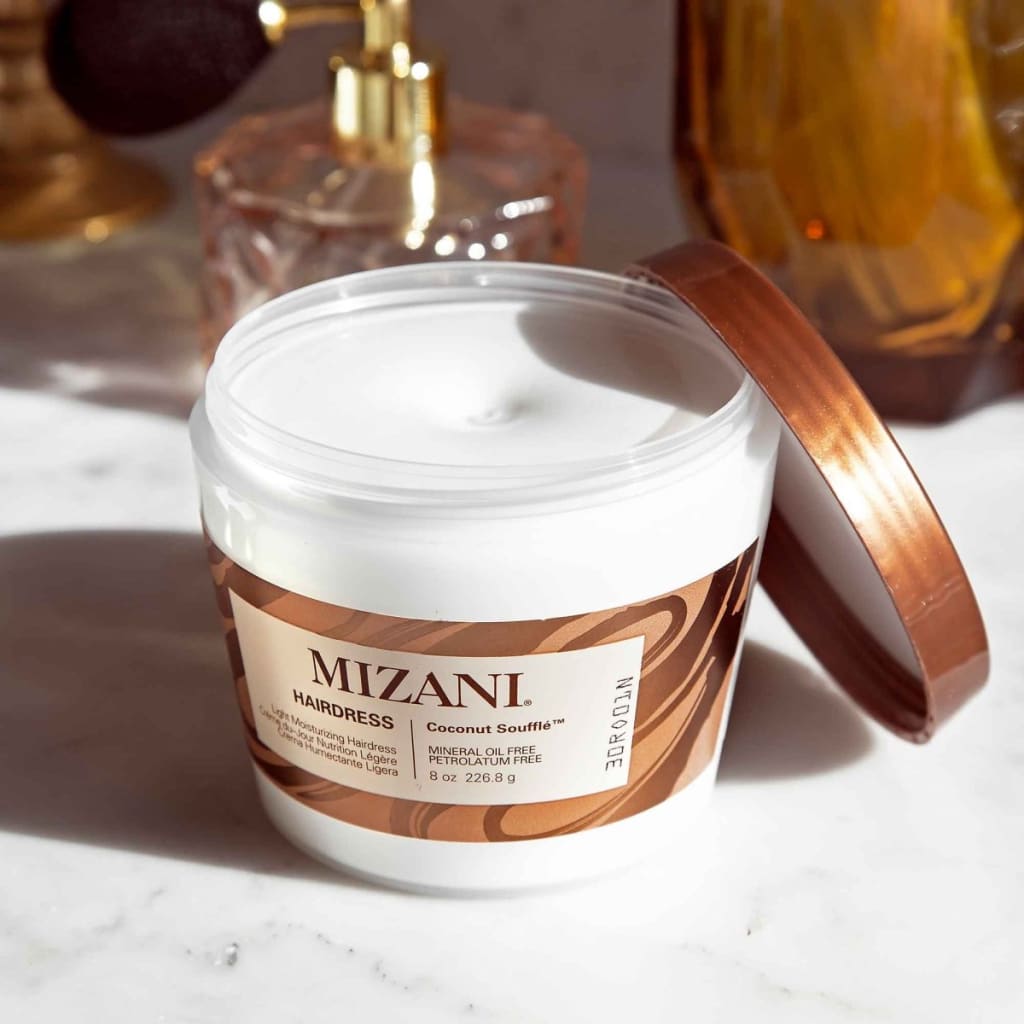 Jar of Mizani Coconut Souffle Hairdress Conditioner 240ml with copper-colored lid