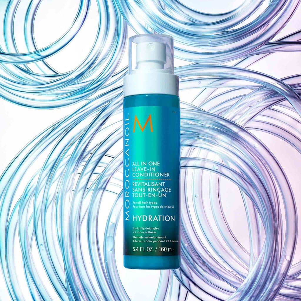 Teal bottle of Moroccanoil All-In-One Leave-In Conditioner for unruly hair hydration