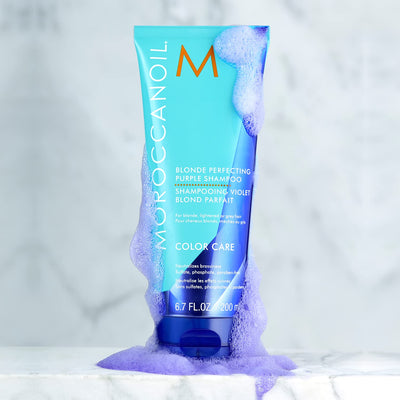 Moroccanoil Blonde Perfecting Purple Shampoo for grey silver and white hair — removes yellow tones