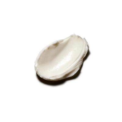 Moroccanoil Body Butter: Creamy moisturizer for intense skincare & hydration. Close-up of dollop.
