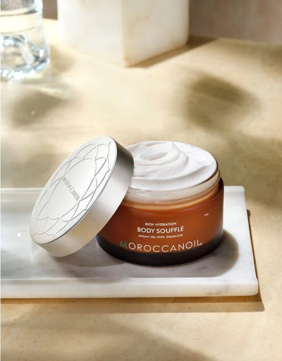 Moroccanoil Body Soufflé: Rich Hydration with Argan Oil and Squalane for Silky Smooth Skin.