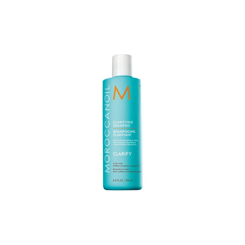 Turquoise bottle of Moroccanoil Clarifying Shampoo 250ml removes everyday buildup