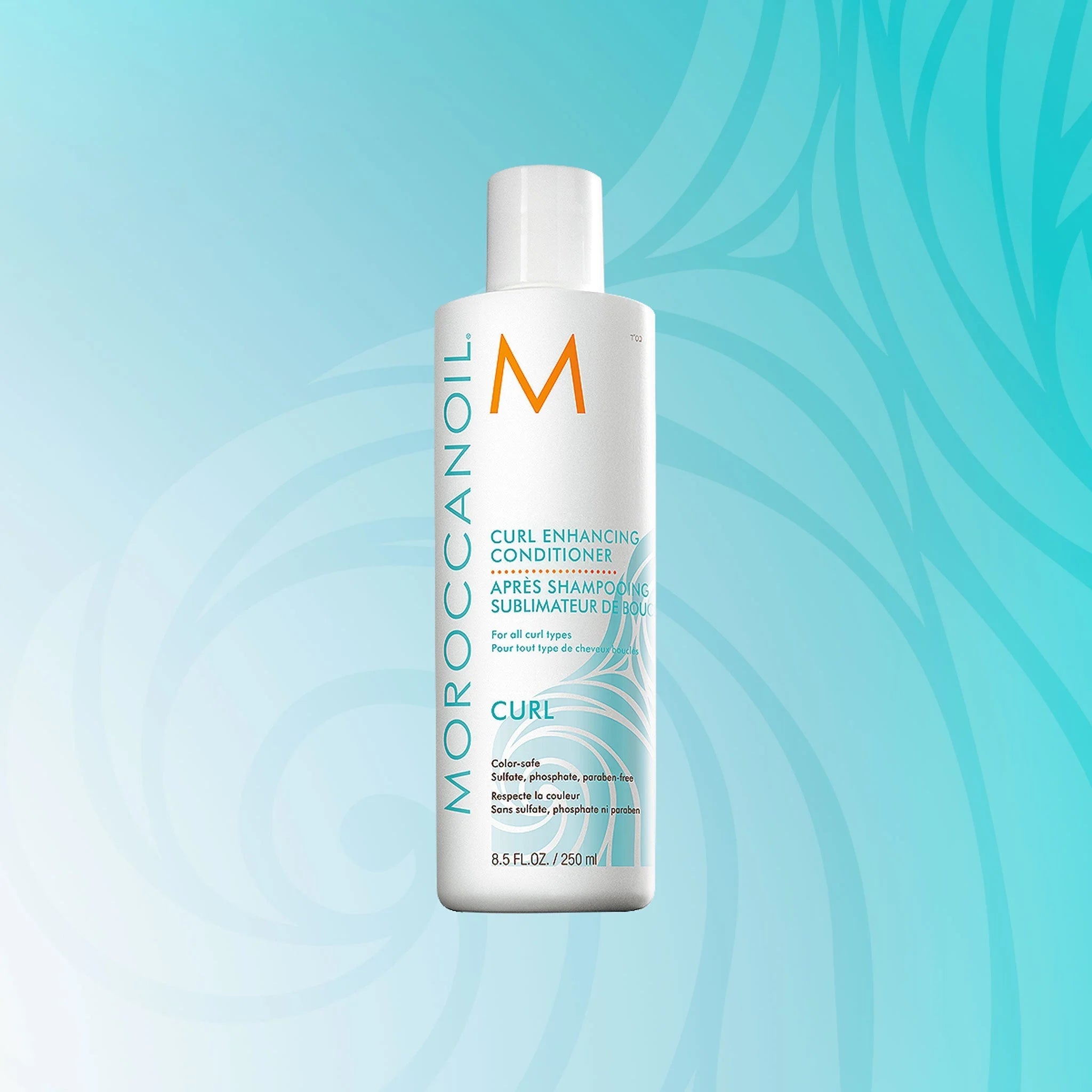 Moroccanoil Curl Enhancing Shampoo bottle for frizz-free curls with orange and teal text