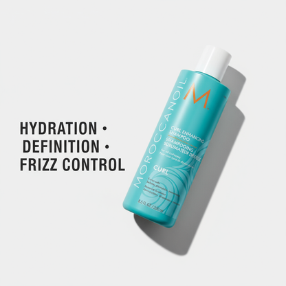 Moroccanoil curl enhancing shampoo turquoise bottle with hydration definition and frizz control benefits